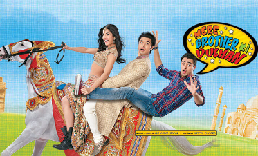 A group of people riding a horse

Description automatically generated