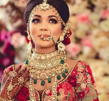 A person in a red dress

Description automatically generated